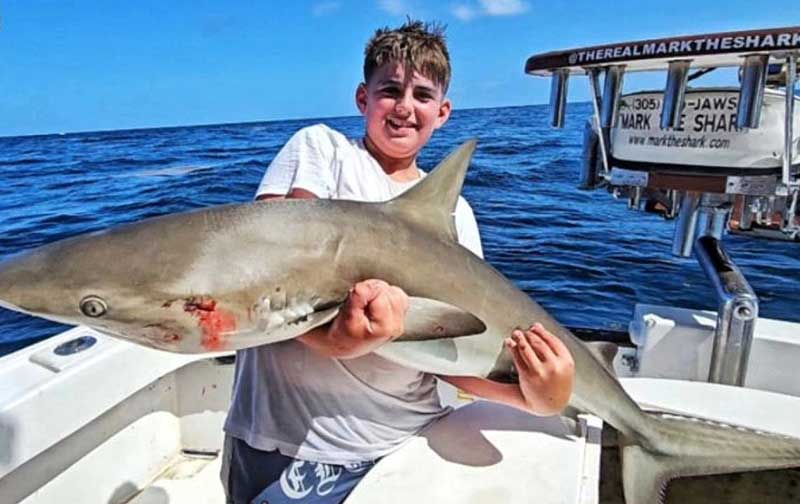 Kids fishing charter photo aboard Mark The Shark